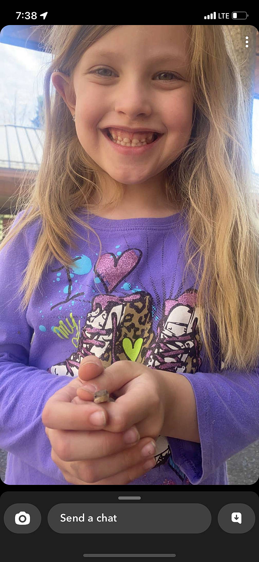 Presley is registered to the contest to win money with this photo: blond, child, electric_blue, eyelash, finger, glass, hand, happy, headwear, insect, joy, moths_and_butterflies, nail, pattern, person, pollinator, sleeve, smile, t_shirt, terrestrial_animal