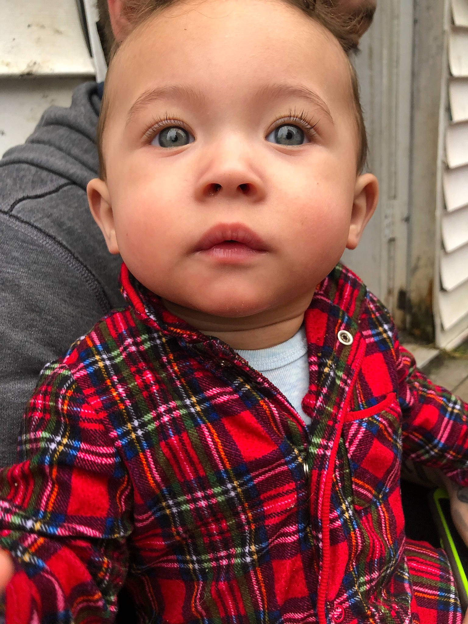 Thomas is registered to the contest to win money with this photo: baby, beauty, cheek, child, child_model, chin, design, eye, eyebrow, face, forehead, head, lip, nose, pattern, person, plaid, skin, tartan, textile