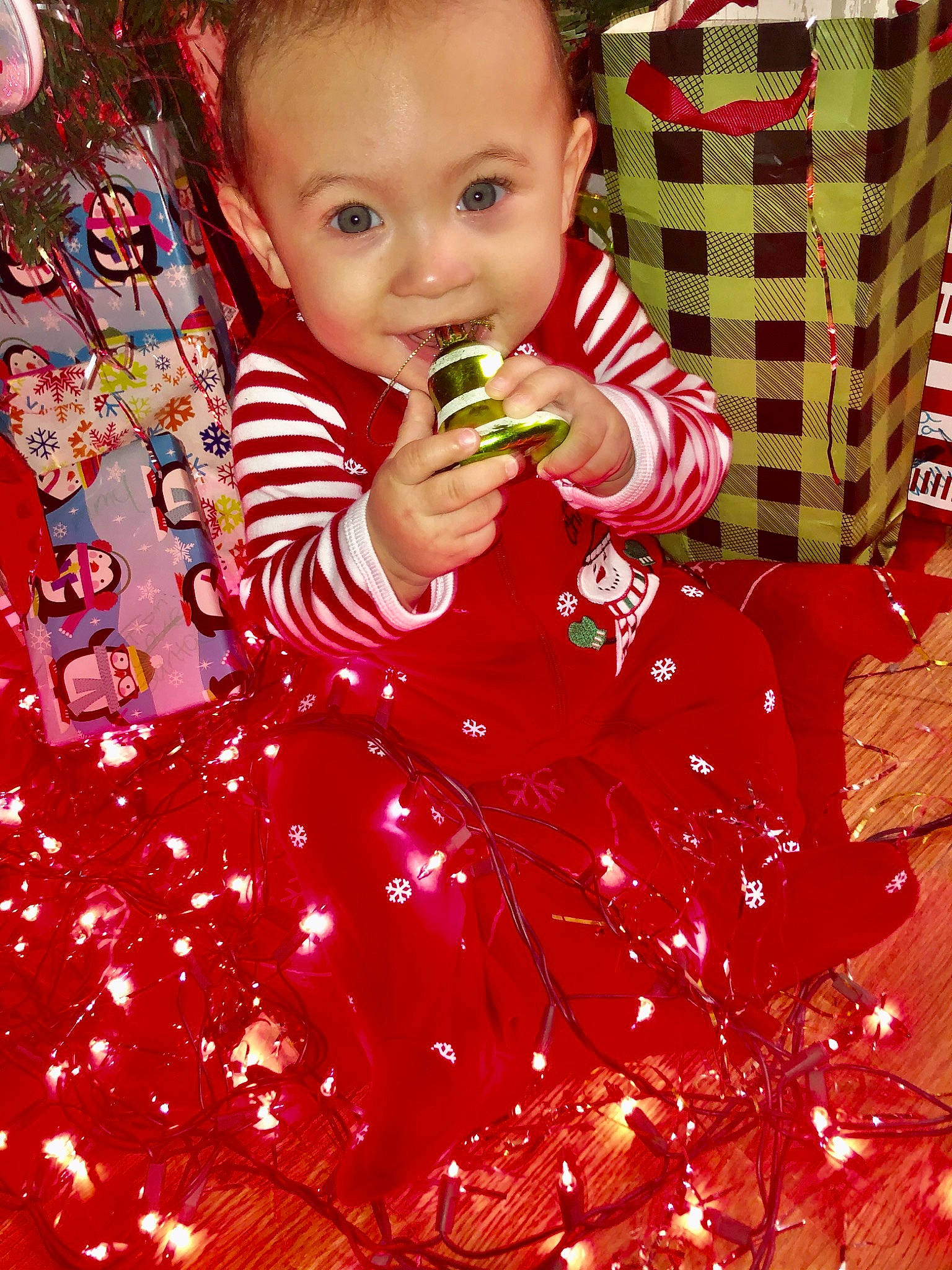 Thomas is registered to the contest to win money with this photo: child, christmas, food, person, red, toddler