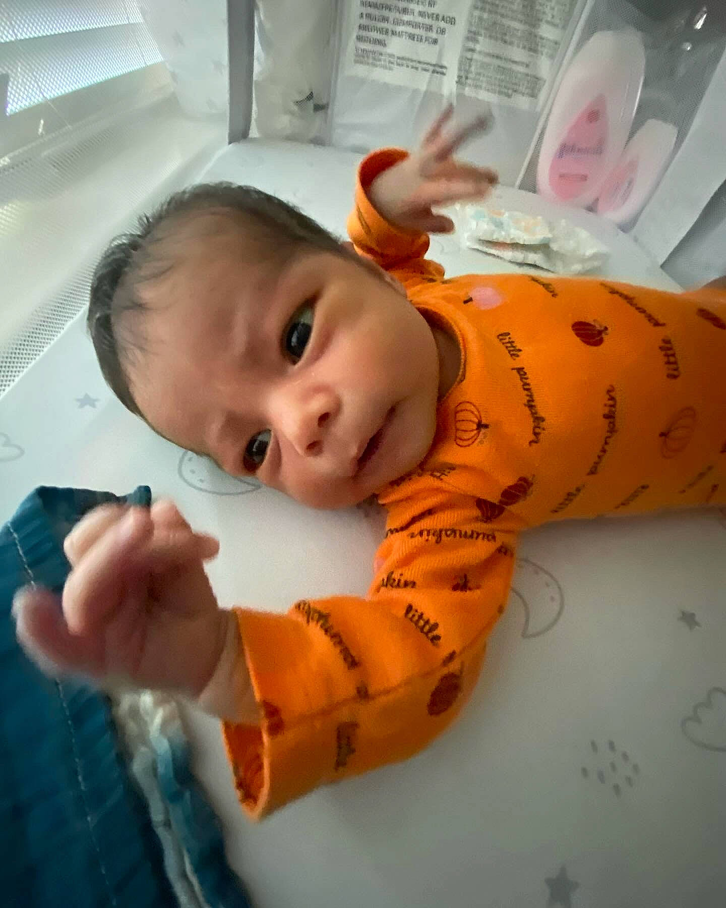 Ravyn joined the competition — help win amazing prizes! baby, baby_products, baby_toddler_clothing, cheek, child, chin, comfort, eyebrow, facial_expression, finger, flooring, fun, hand, mouth, nose, person, room, skin, sleeve, thumb