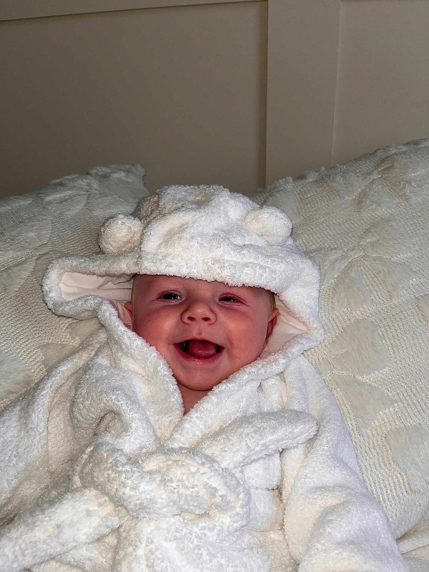 Dexter joined the competition — help win amazing prizes! baby, smiling, white_bathrobe, hood, bear_ears, blanket, indoor, happy, cute, infant, face, child, portrait, soft_texture, cozy, closeup, warm, comfort, person, toddler