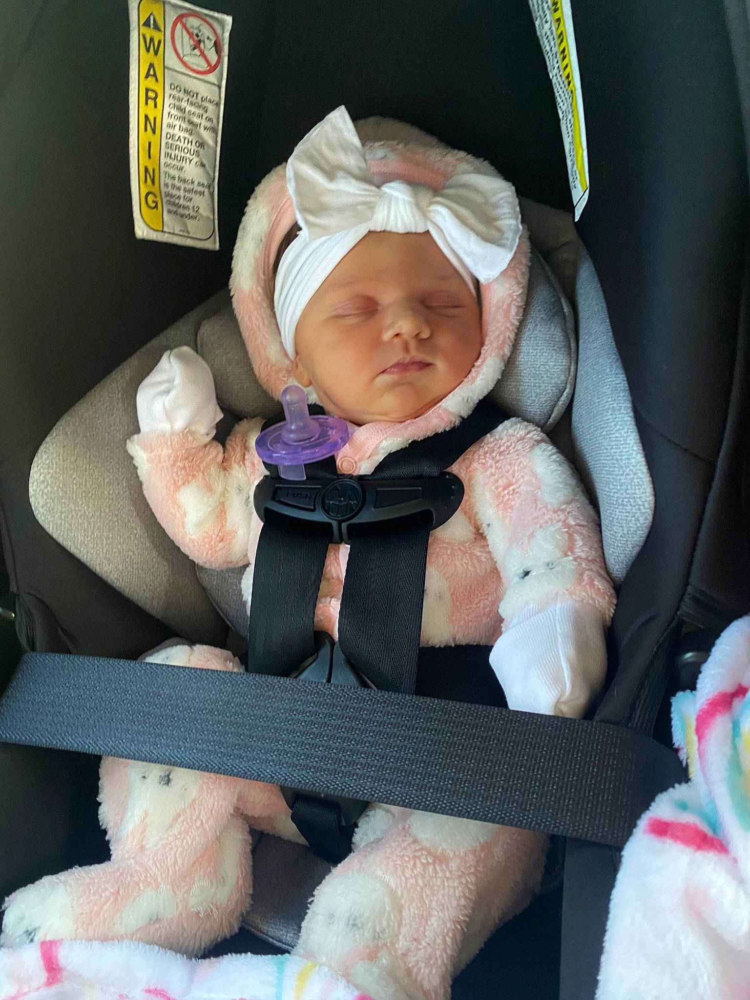 Jordynn is registered to the contest to win money with this photo: baby, baby_carriage, baby_in_car_seat, baby_products, baby_safety, baby_toddler_clothing, car_seat, cheek, child, comfort, headwear, lap, linens, pattern, person, product, sitting, sleeve, sock, textile
