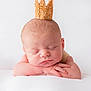baby, newborn, sleeping, crown, cute, infant, peaceful, portrait, hands, head, soft, resting, white_background, closeup, adorable, skin, child, peace, serene, delicate