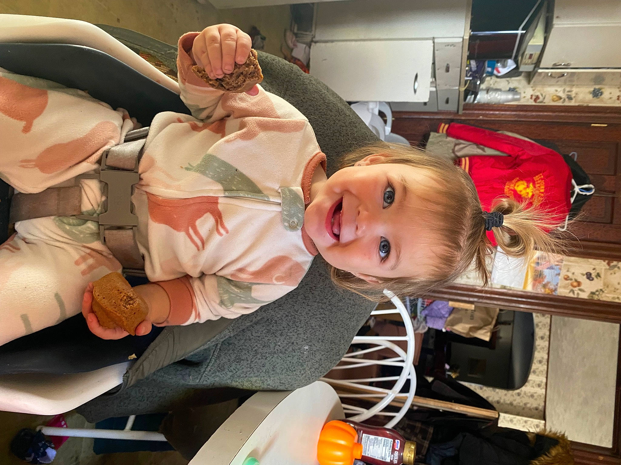 Mckenzie is registered to the contest to win money with this photo: auto_part, baby, baby_carriage, baby_products, cabinetry, child, fictional_character, fun, home_appliance, joy, kitchen, kitchen_appliance, luxury_vehicle, motor_vehicle, person, personal_protective_equipment, refrigerator, room, smile, toddler