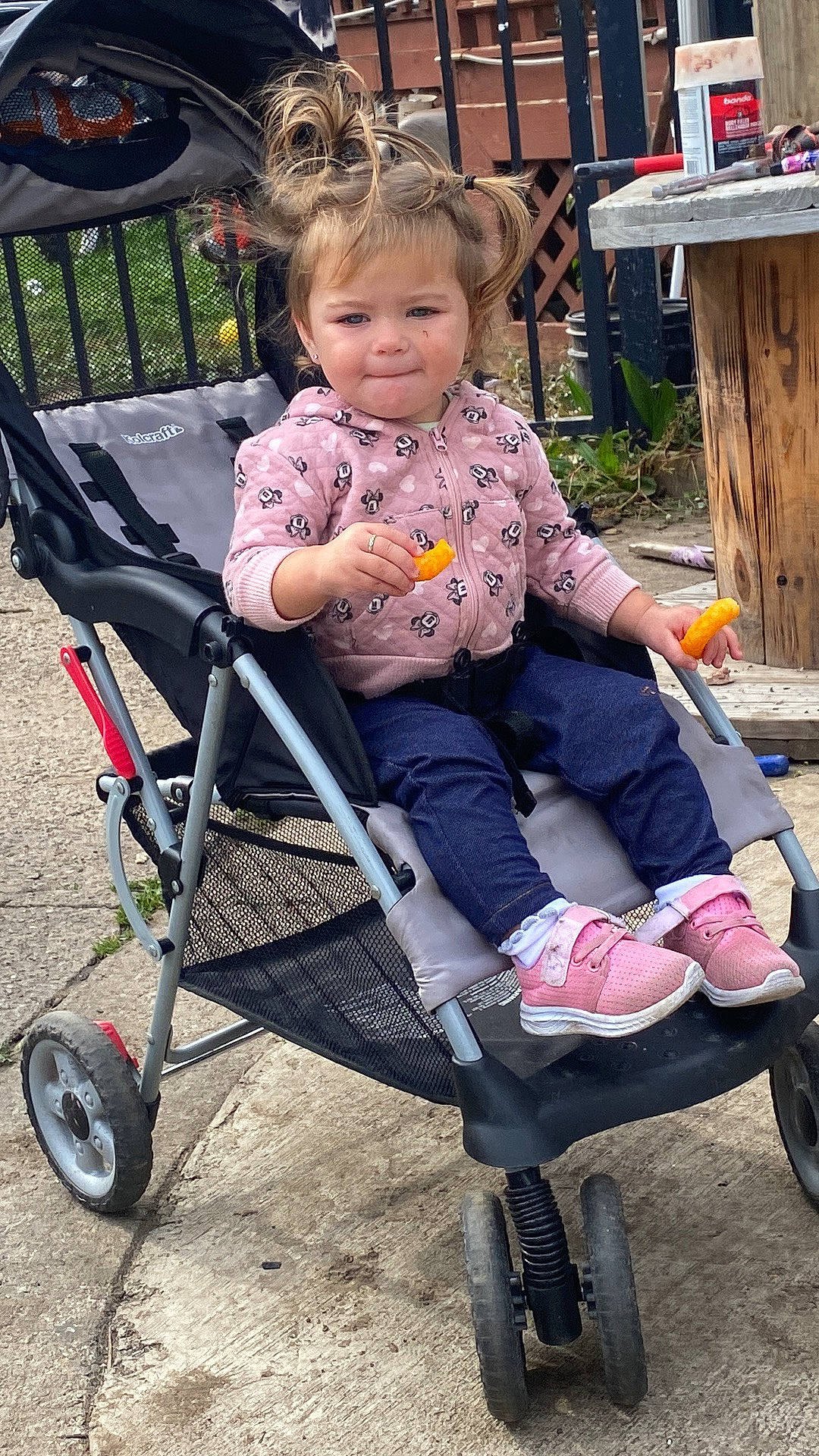 Mckenzie is registered to the contest to win money with this photo: baby, baby_carriage, baby_products, beauty, chair, child, green, mammal, people, person, photograph, product, public_space, sitting, smile, snapshot, tire, toddler, vehicle, wheel