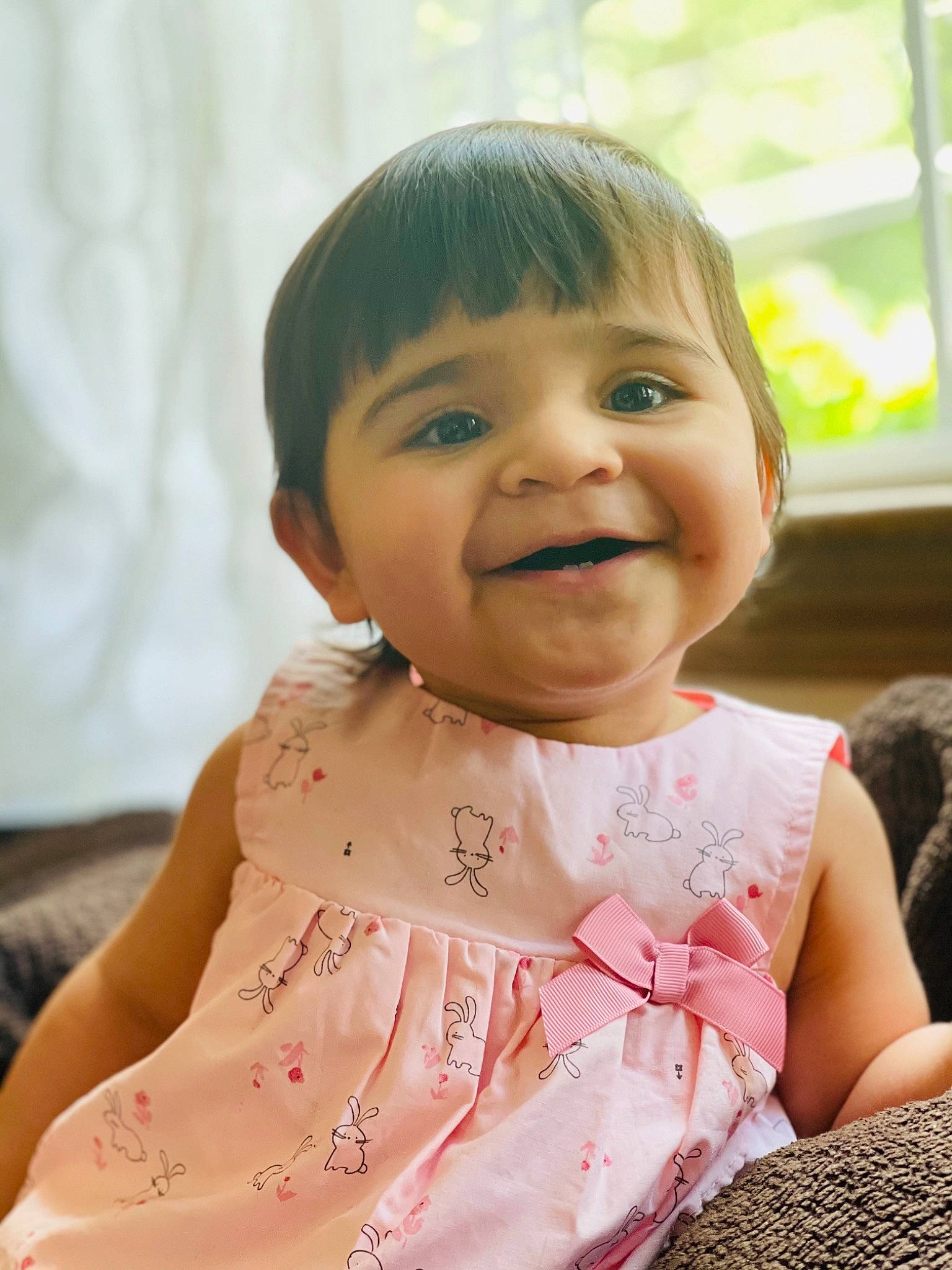 Aisha joined the competition — help win amazing prizes! baby, baby_toddler_clothing, cheek, child, chin, dress, eyelash, face, facial_expression, fun, happy, iris, joy, lip, neck, nose, person, pink, skin, sleeve