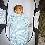 Tom joined the competition — help win amazing prizes! baby, sleeping, infant, blue_sleeper, baby_sleeper, face, closed_eyes, peaceful, carpet, soft, indoor, cozy, child, newborn, resting, cute, person, hands, head, fabric