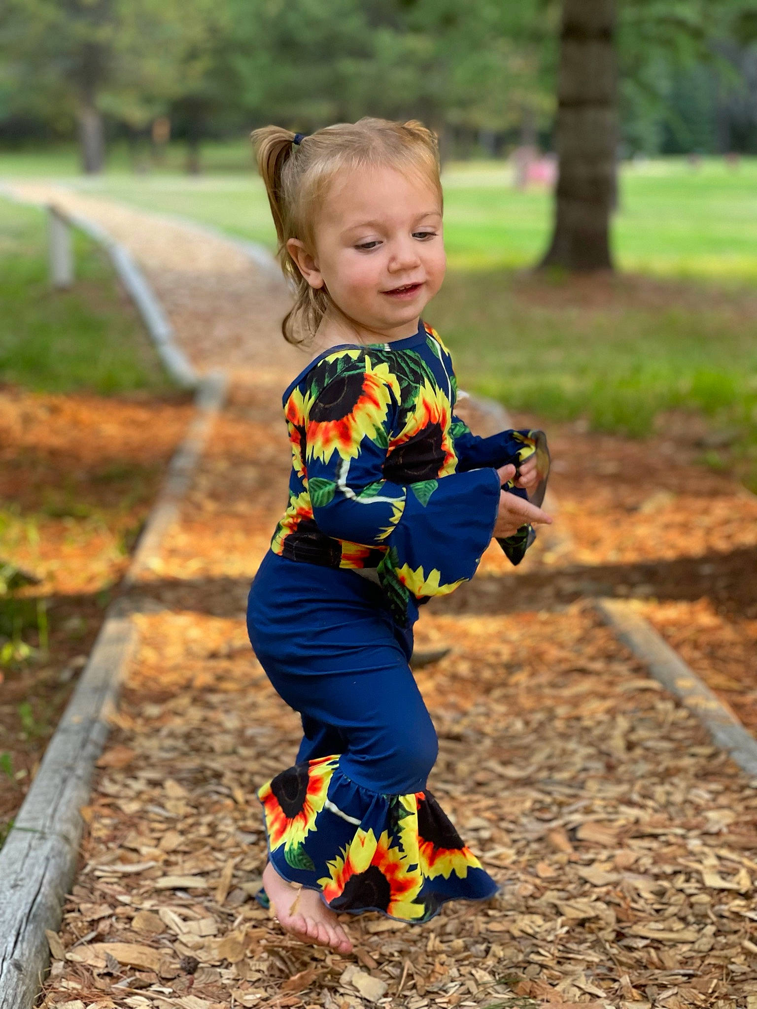 Haizley is registered to the contest to win money with this photo: arm, baby, baby_toddler_clothing, child, denim, electric_blue, grass, happy, leisure, pattern, people_in_nature, person, plaid, plant, recreation, smile, street_fashion, t_shirt, toddler, tree