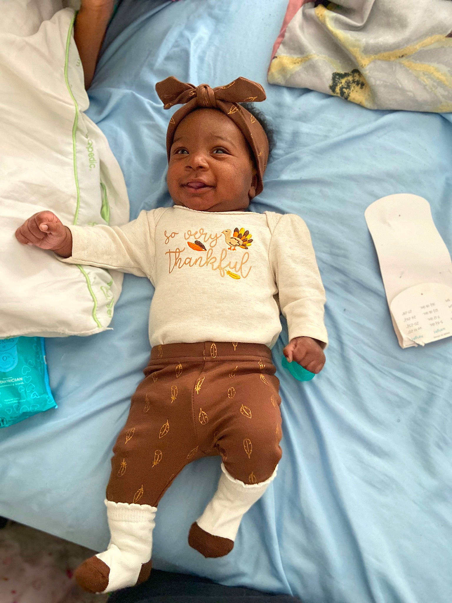 Jakariah joined the competition — help win amazing prizes! baby, baby_toddler_clothing, child, comfort, event, finger, fun, gesture, happy, hat, headwear, joint, joy, linens, person, pillow, skin, sleeve, t_shirt, textile