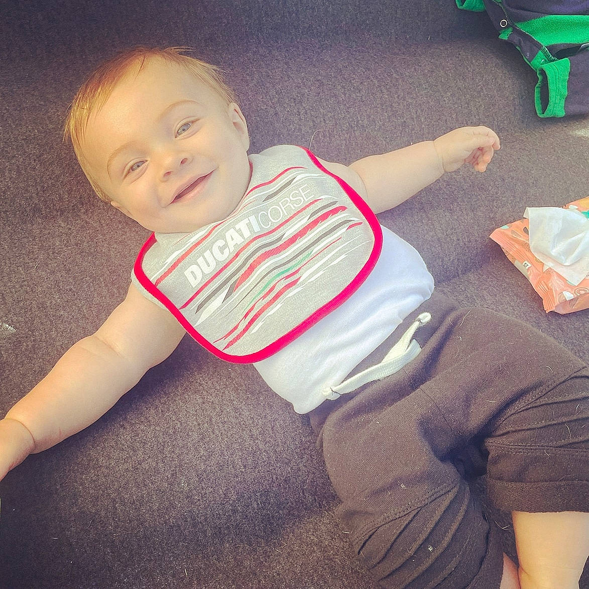 Chayse is registered to the contest to win money with this photo: baby_toddler_clothing, cloud, cool, elbow, eyewear, finger, floor, green, happy, head, joy, knee, mouth, muscle, neck, person, shoulder, sleeve, smile, t_shirt