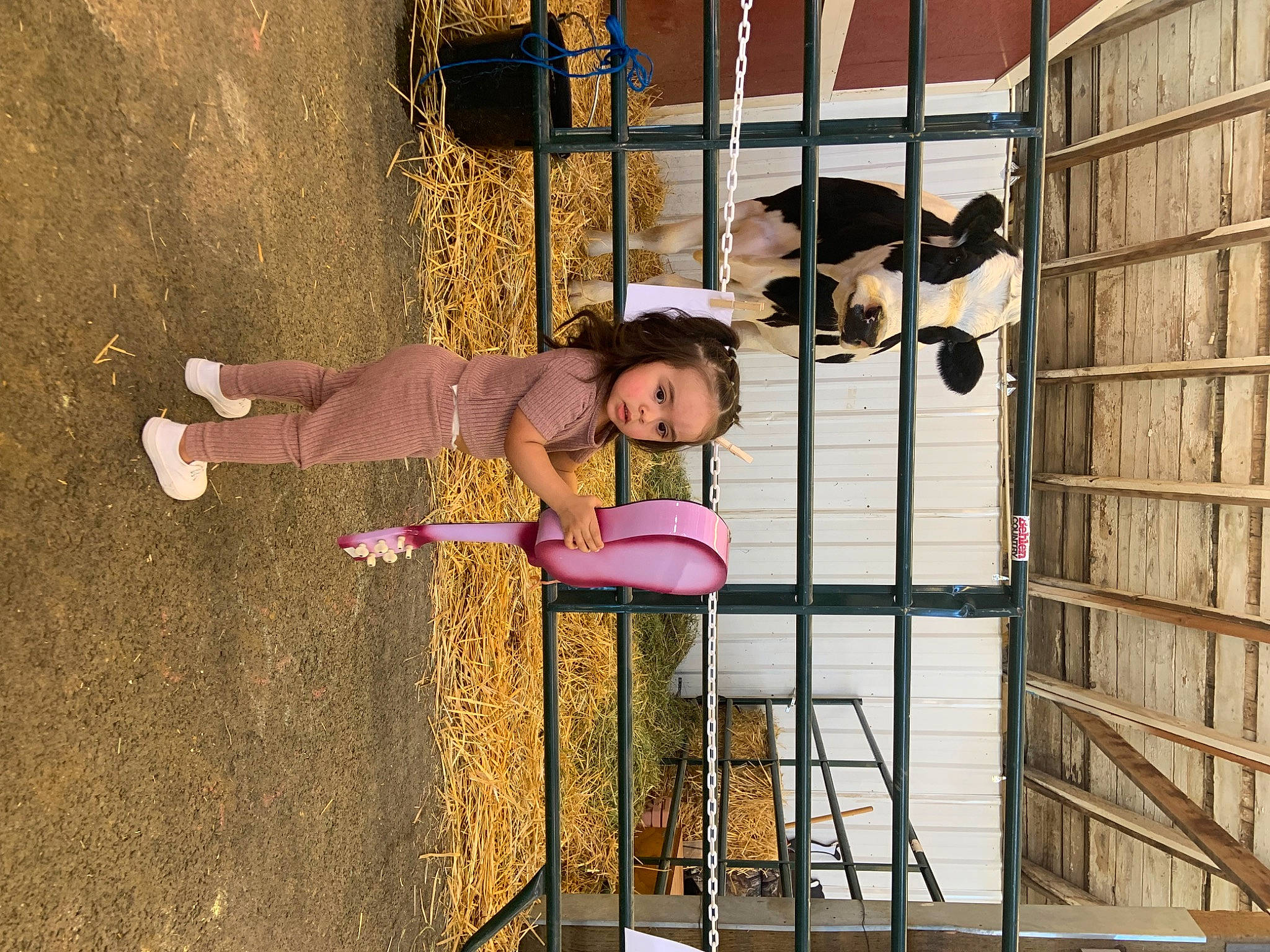 Melani is registered to the contest to win money with this photo: child, city, fun, hat, leisure, magenta, person, play, recreation, smile, toddler, tree, wood