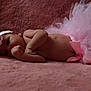 Lyana a rejoint le concours — aidez-le/la à gagner de superbes lots ! baby, infant, pink, tutu, headband, flower, cute, lying_down, soft_texture, skin, newborn, adorable, portrait, child, sleepy, hand, cuteness, delicate, resting, indoors
