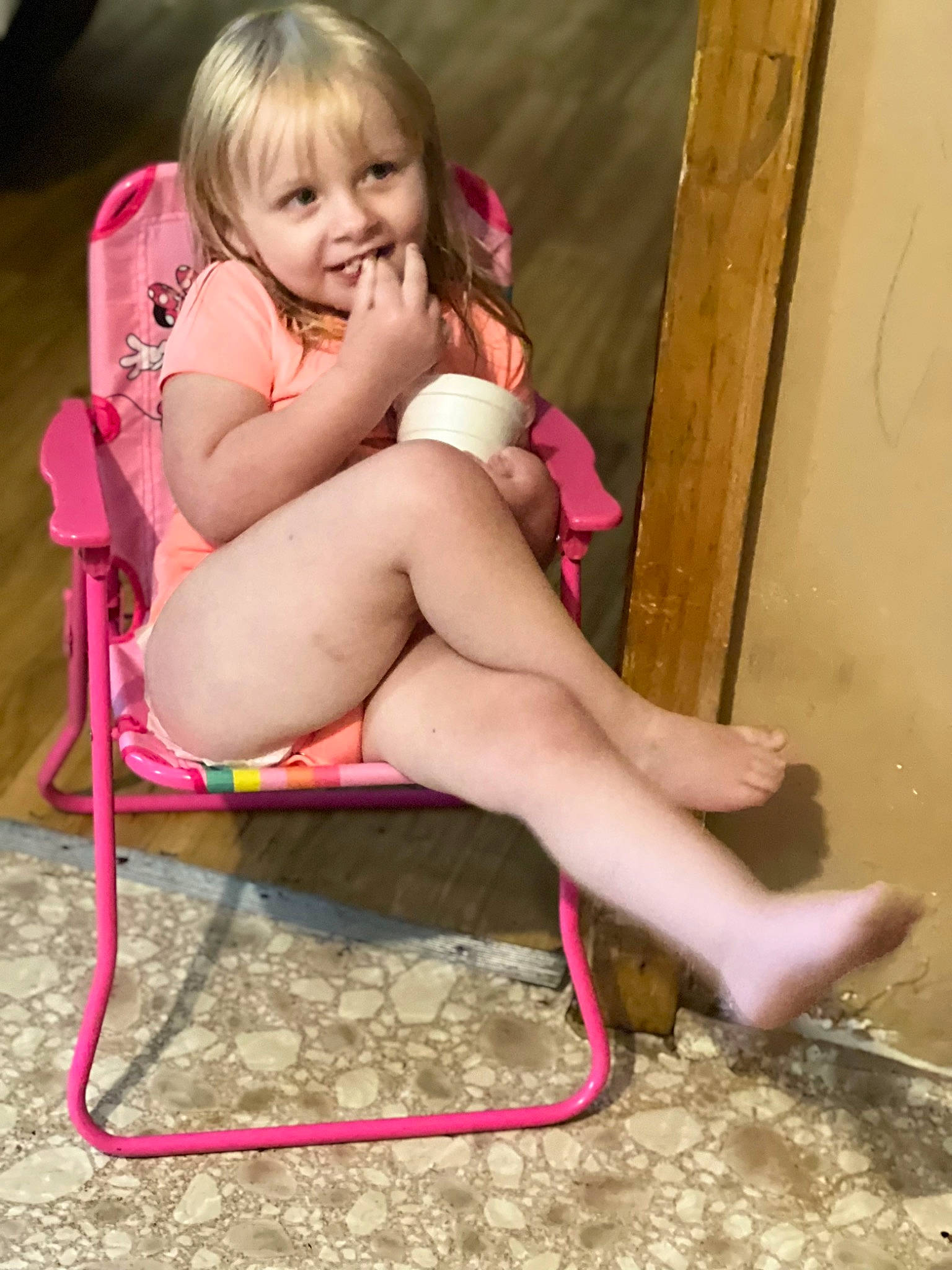 Addilynn is registered to the contest to win money with this photo: chair, eye, face, foot, grass, hair, happy, human_body, human_leg, joy, knee, leg, lip, magenta, person, pink, shorts, sitting, skin, smile