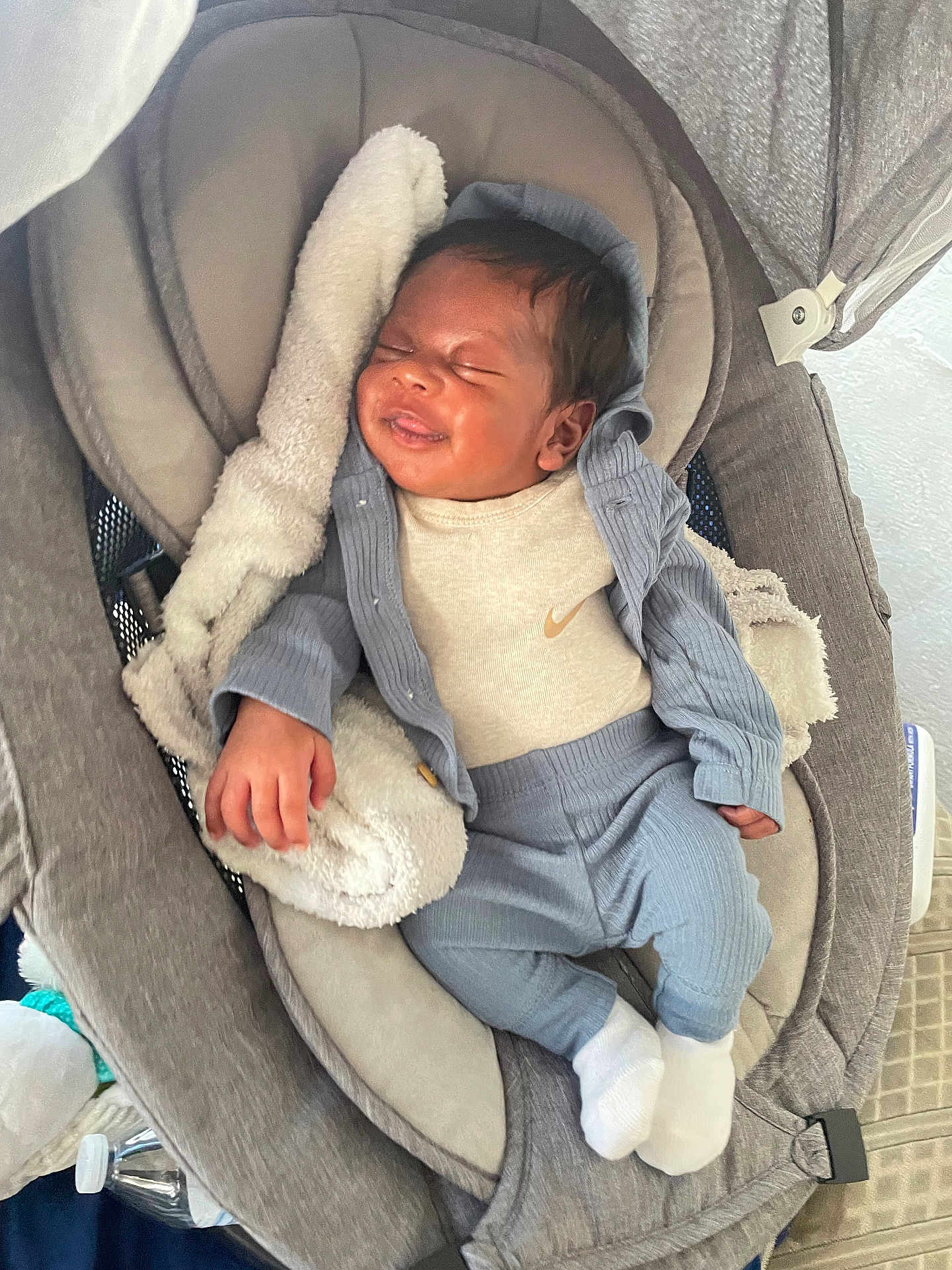 Carlos Jr joined the competition — help win amazing prizes! baby, sleeping, infant, baby_seat, clothing, socks, blanket, cozy, smile, face, hand, head, indoors, comfort, rest, relaxation, child, person, soft, cute