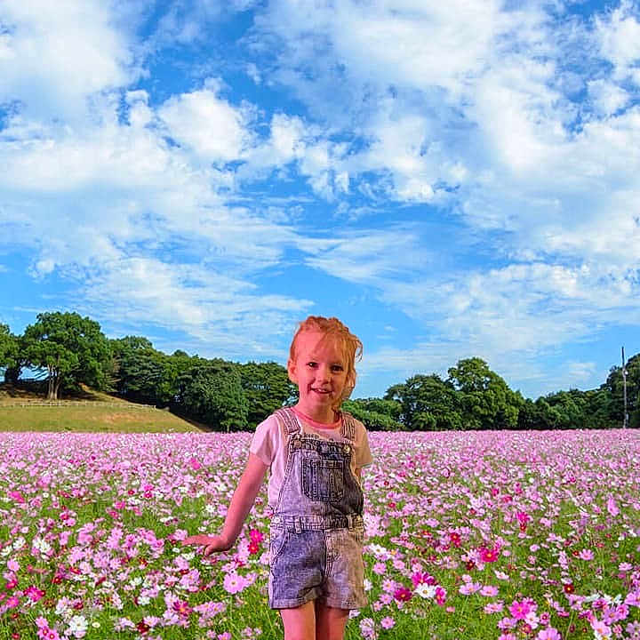 Elibeath joined the competition — help win amazing prizes! blonde, child, clothing, curlyhair, face, female, flower, footwear, girl, hair, head, horizon, nature, outdoors, person, petal, plant, shoe, shorts, sky