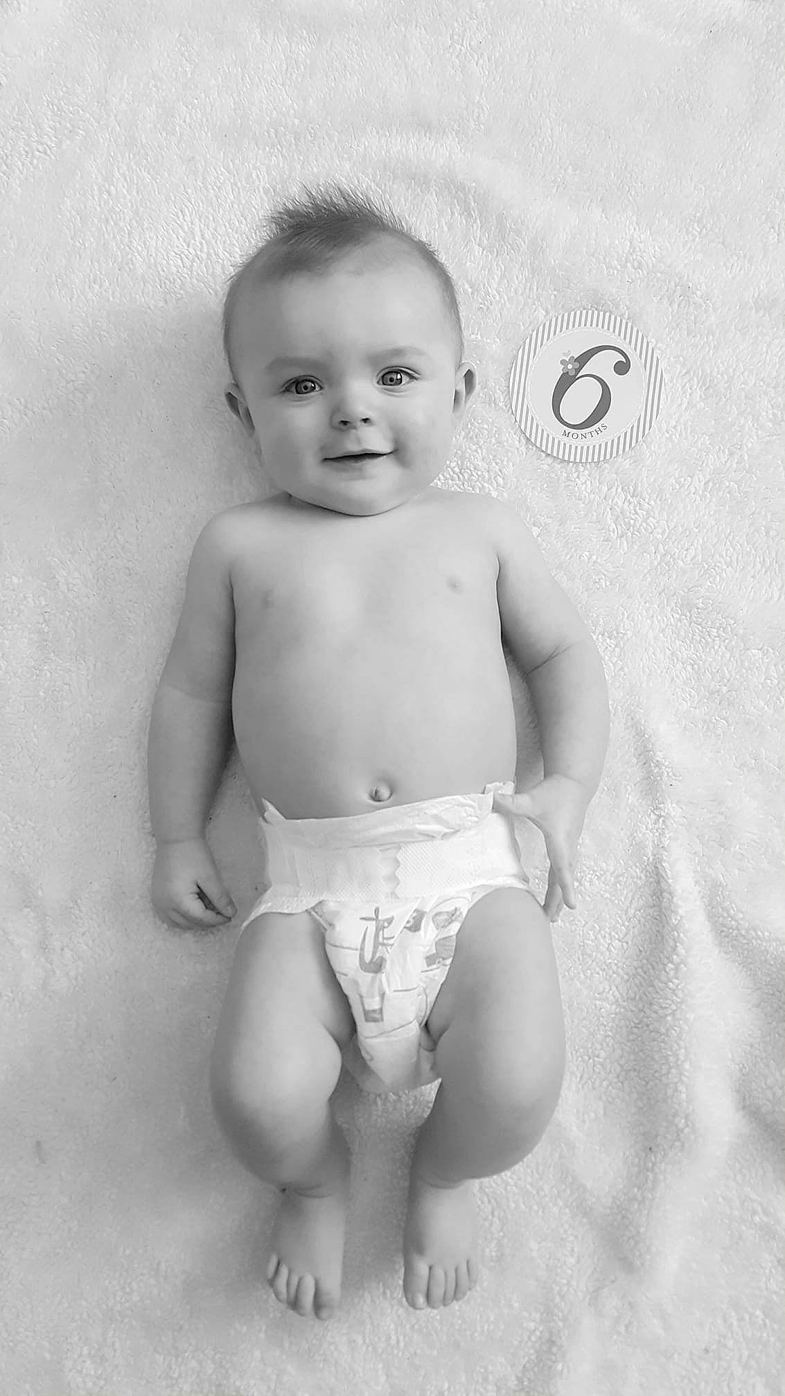 Bostyn is registered to the contest to win money with this photo: baby, black_and_white, chest, child, eye, leg, monochrome, monochrome_photography, person, photograph, photography, sitting, skin, smile, standing, stomach, style, toddler, trunk, white