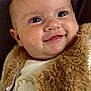 baby, infant, smile, face, eyes, clothing, jacket, fuzzy, white_shirt, cloud_design, cute, portrait, closeup, skin, happy, child, young, warm, cozy, person