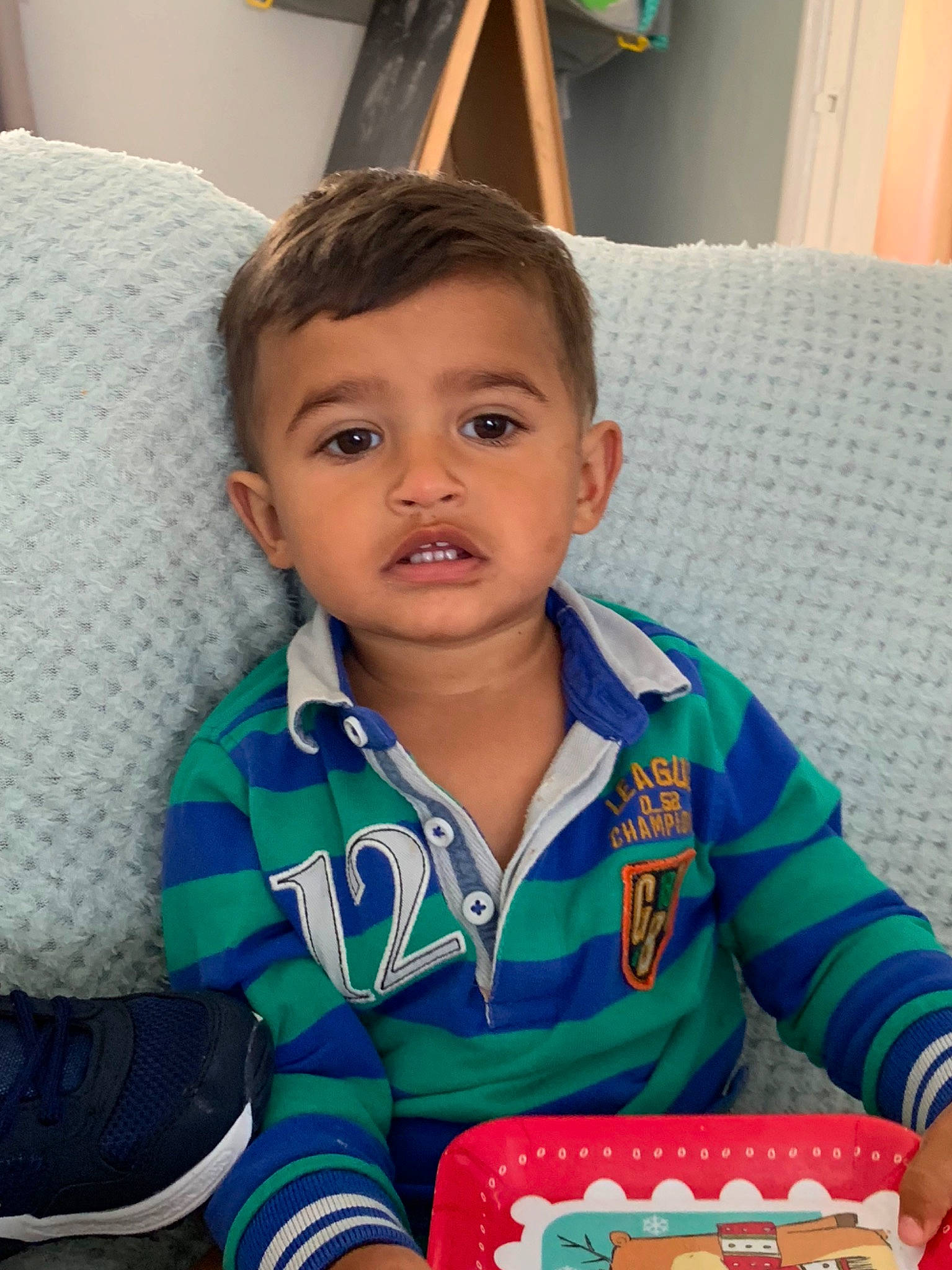 Jai is registered to the contest to win money with this photo: baby, child, face, person, play, sitting, smile, toddler