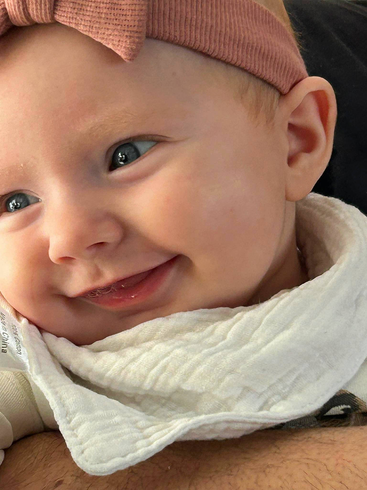 Eve participe au concours pour gagner de l'argent avec cette photo : baby, baby_toddler_clothing, cap, cheek, chin, eyebrow, eyelash, happy, hat, headgear, lip, mouth, nose, outerwear, person, plant, product, skin, smile, toddler