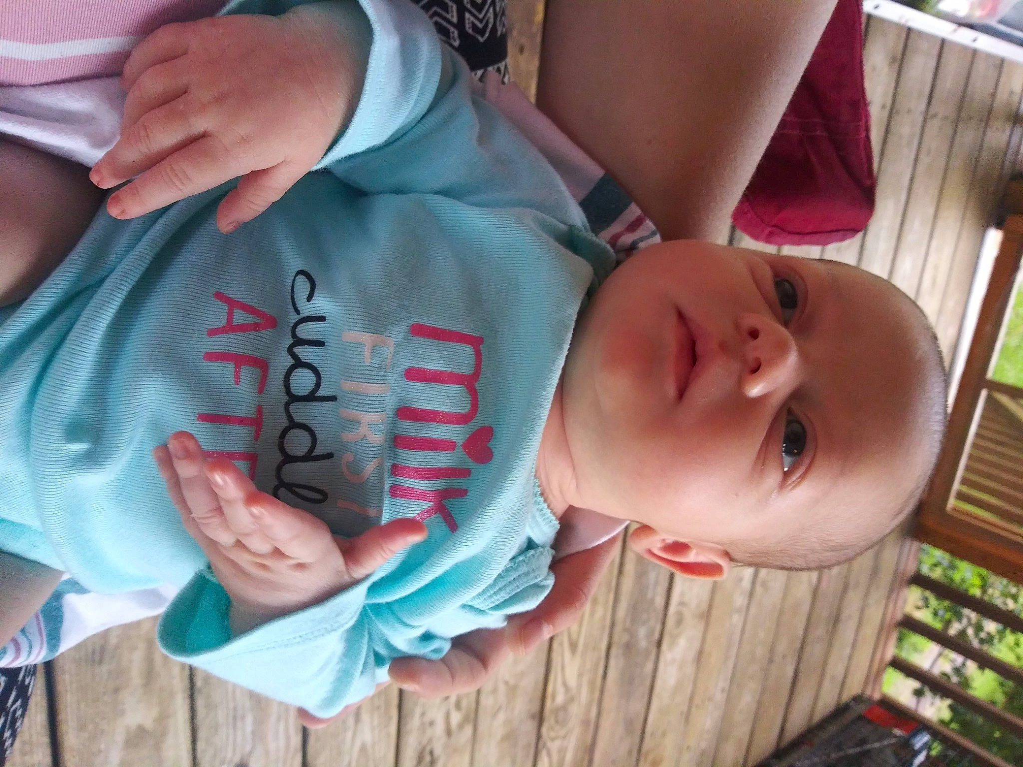 Kaylynn is registered to the contest to win money with this photo: baby, baby_toddler_clothing, cheek, chin, facial_expression, finger, gesture, hand, happy, human, human_body, mammal, mouth, nose, person, pink, product, skin, sleeve, tree