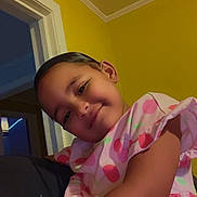 Autumn joined the competition — help win amazing prizes! child, girl, smile, pink_dress, polka_dots, indoor, yellow_wall, portrait, happy, cute, person, face, arm, earrings, short_hair, holding, colorful, cozy, home, toddler