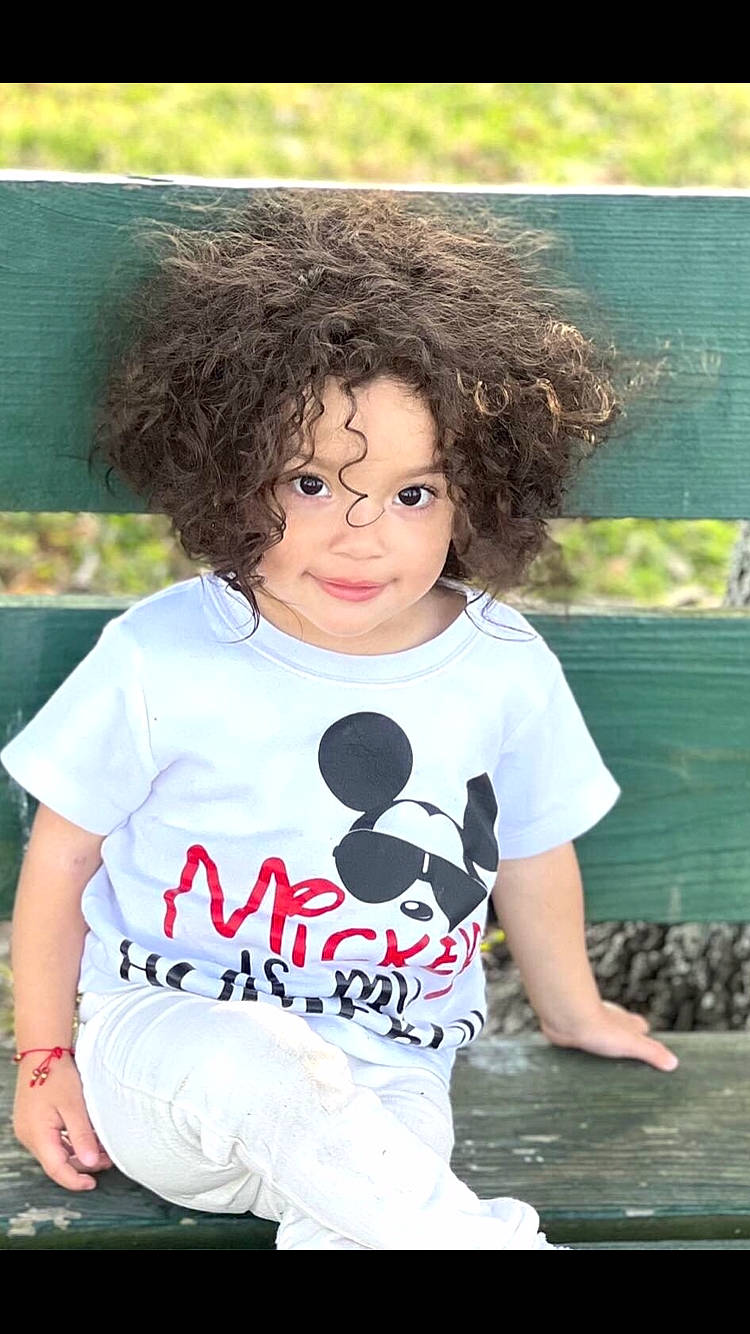 Kaylani is registered to the contest to win money with this photo: afro, beauty, black_hair, child, cool, eye, face, flash_photography, fun, grass, happy, jheri_curl, leisure, lip, people_in_nature, person, ringlet, sleeve, summer, t_shirt