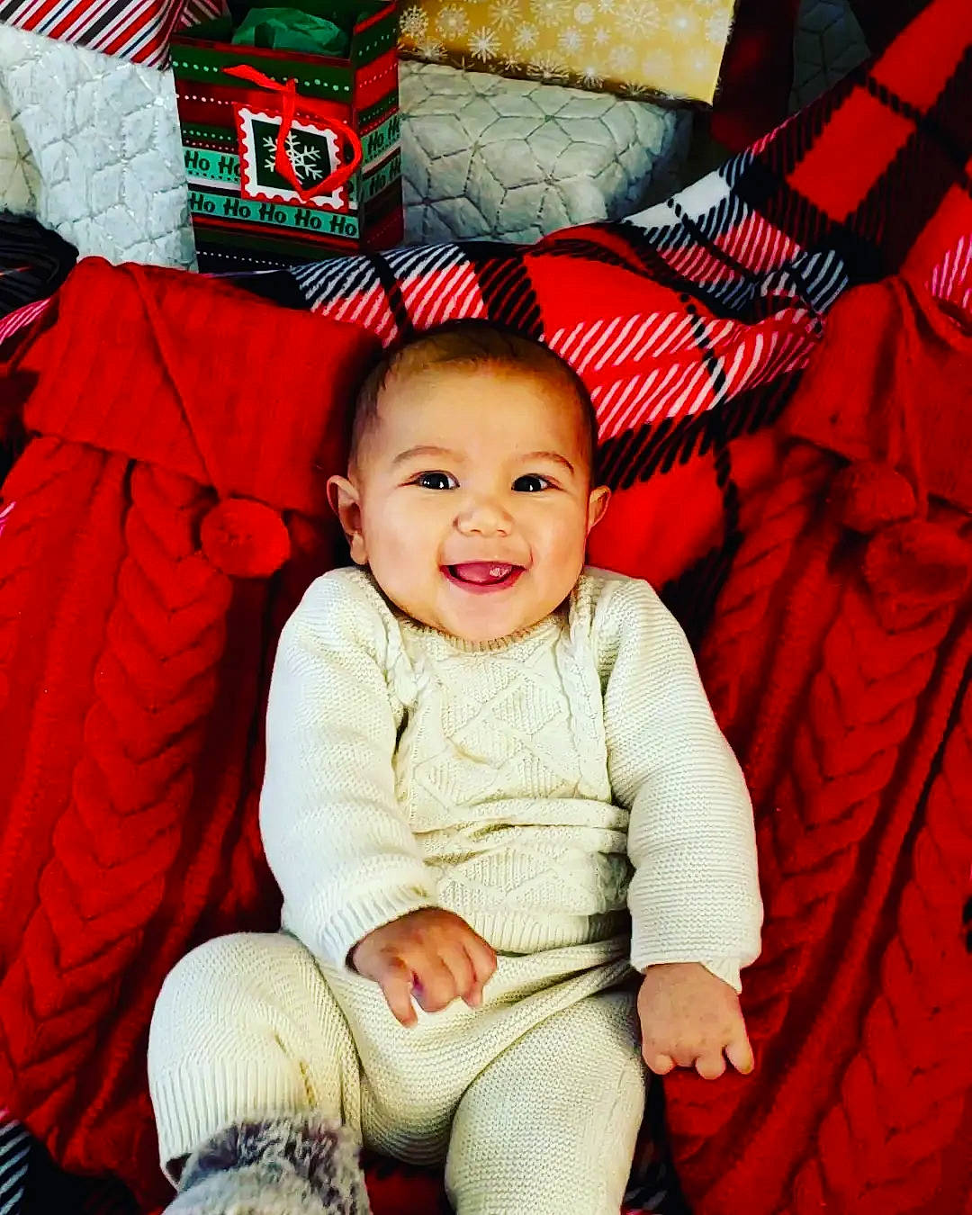Maverick joined the competition — help win amazing prizes! baby, baby_toddler_clothing, carmine, christmas, christmas_eve, comfort, event, eye, fictional_character, happy, head, holiday, joy, lap, outerwear, person, red, sitting, sleeve, smile