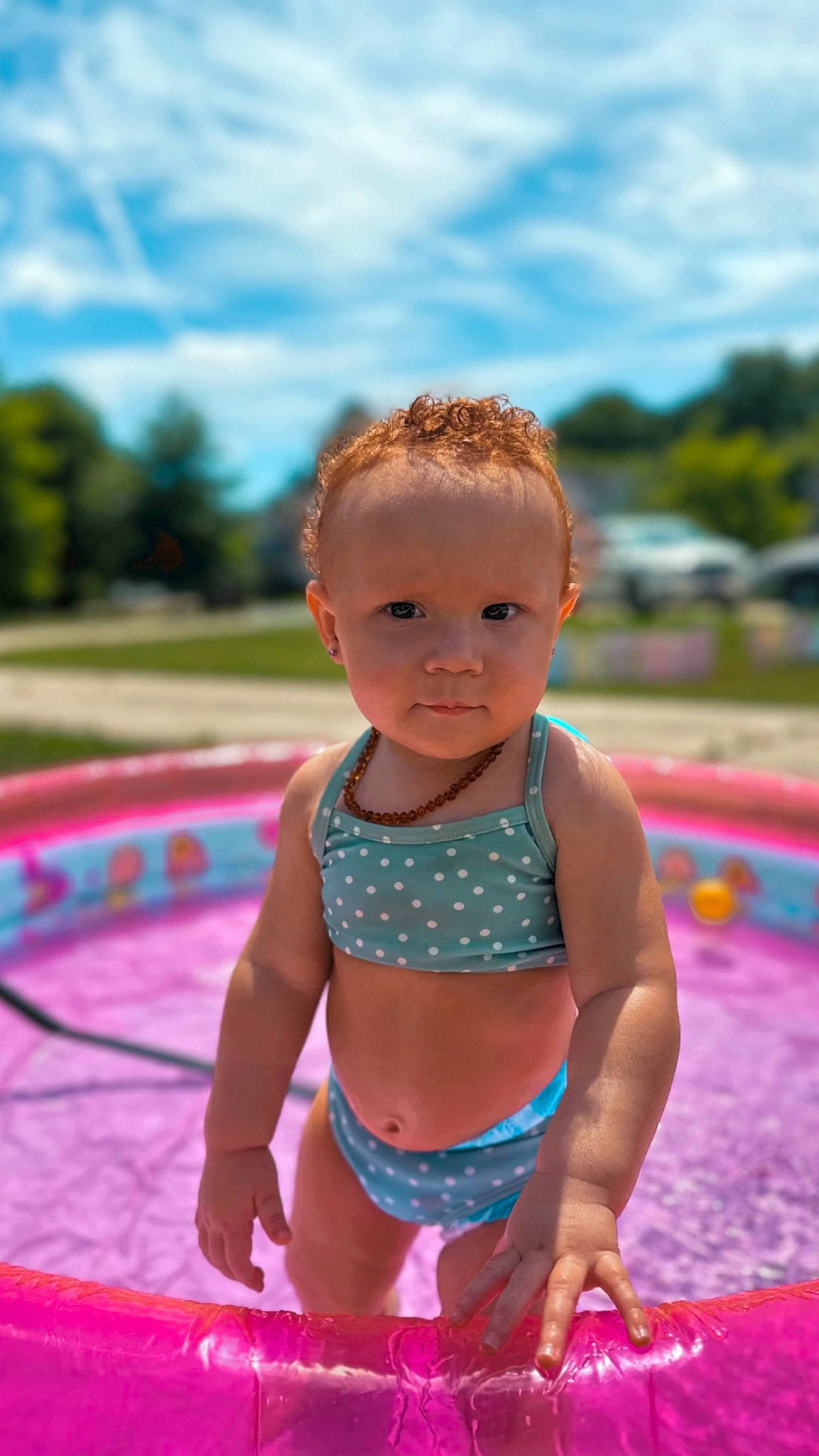 Alaya is registered to the contest to win money with this photo: aqua, azure, baby, child, cloud, daytime, fun, grass, happy, leisure, magenta, person, pink, recreation, sky, summer, swimwear, toddler, trunk, underpants