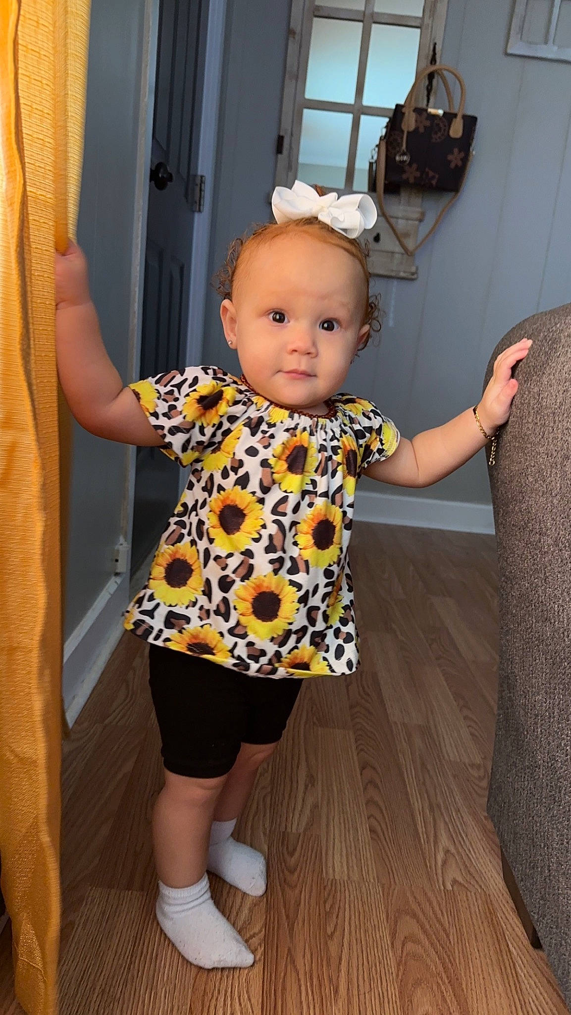 Alaya joined the competition — help win amazing prizes! baby, baby_toddler_clothing, child, finger, floor, flooring, fun, gesture, happy, human_leg, joint, knee, pattern, person, shoulder, sleeve, sock, thigh, thumb, toddler
