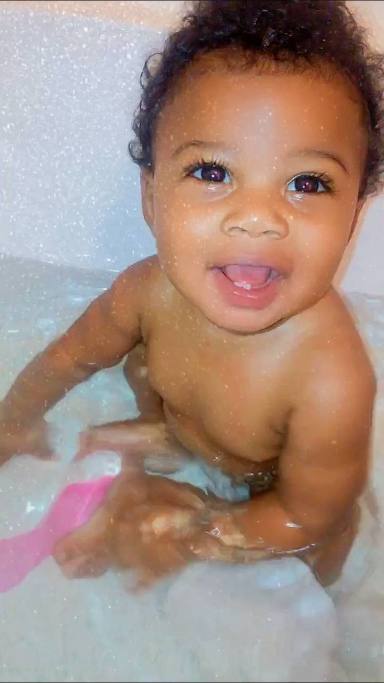 Kason is registered to the contest to win money with this photo: baby, baby_bathing, bathing, bathtub, cheek, child, eye, eyebrow, face, facial_expression, forehead, fun, head, joy, lip, nose, person, skin, smile, toddler