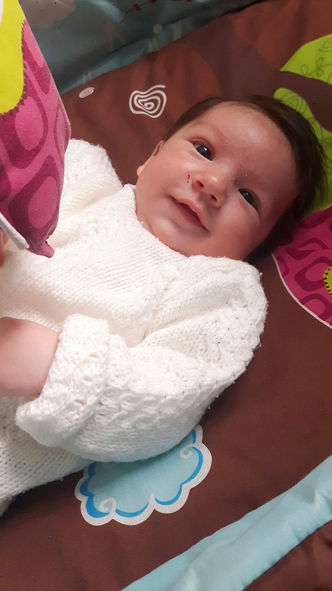 Sean participe au concours pour gagner de l'argent avec cette photo : baby, cheek, child, eye, head, mouth, nose, person, pink, product, skin, smile, textile, toddler