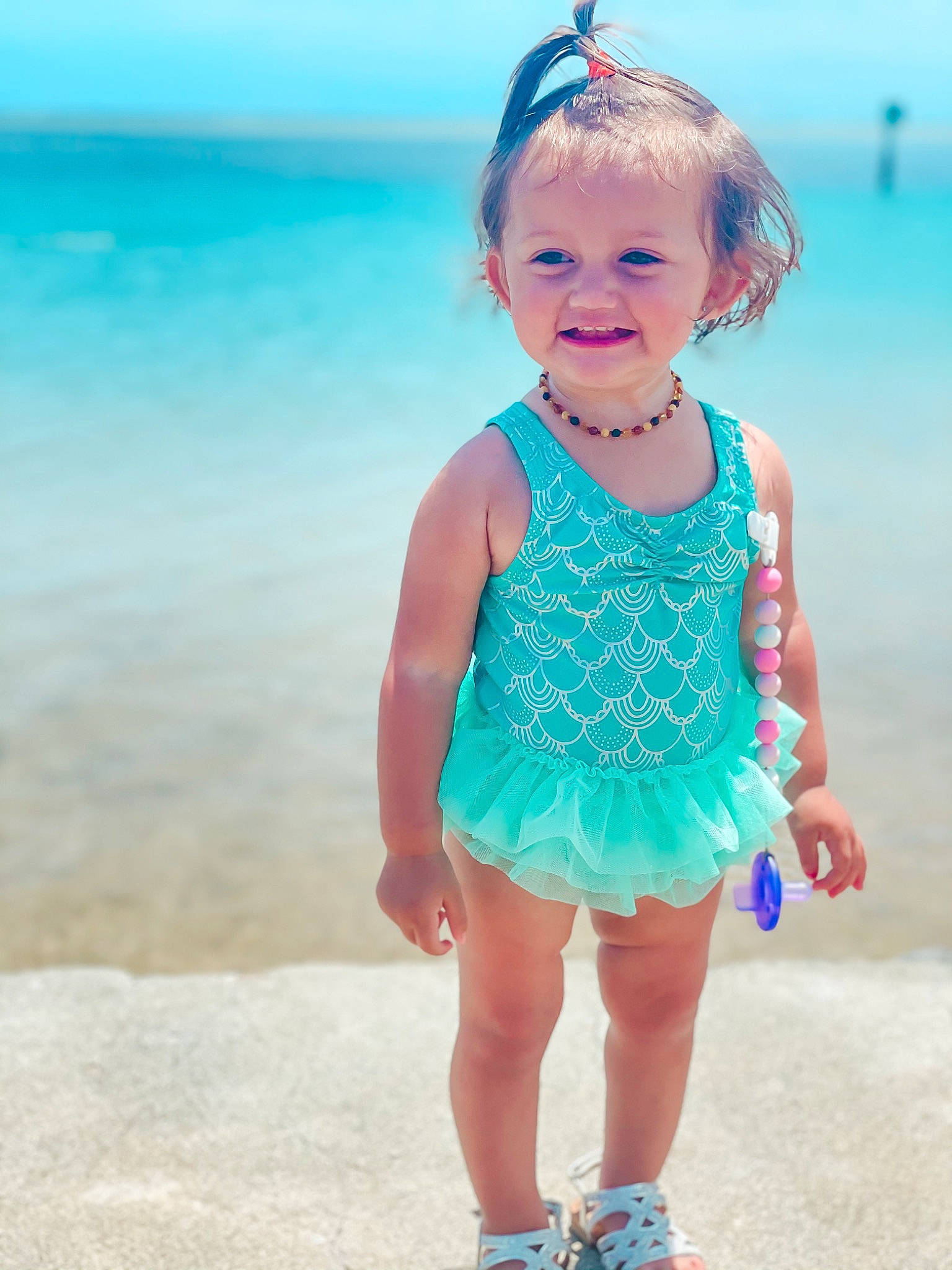 Bayley joined the competition — help win amazing prizes! aqua, azure, baby_toddler_clothing, beach, blue, day_dress, dress, face, fun, hair, hairstyle, happy, head, joy, person, pink, skin, sky, standing, summer