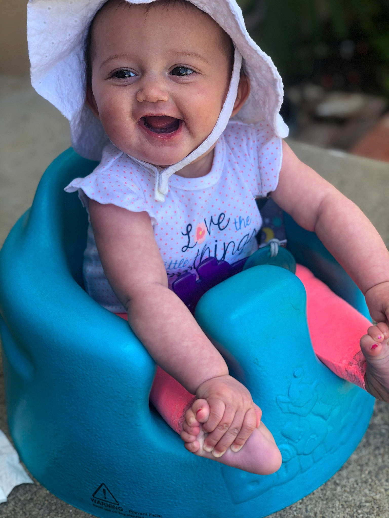 Bayley is registered to the contest to win money with this photo: baby, baby_products, baby_toddler_clothing, blue, child, fun, leisure, person, pink, play, product, sitting, skin, smile, toddler, turquoise