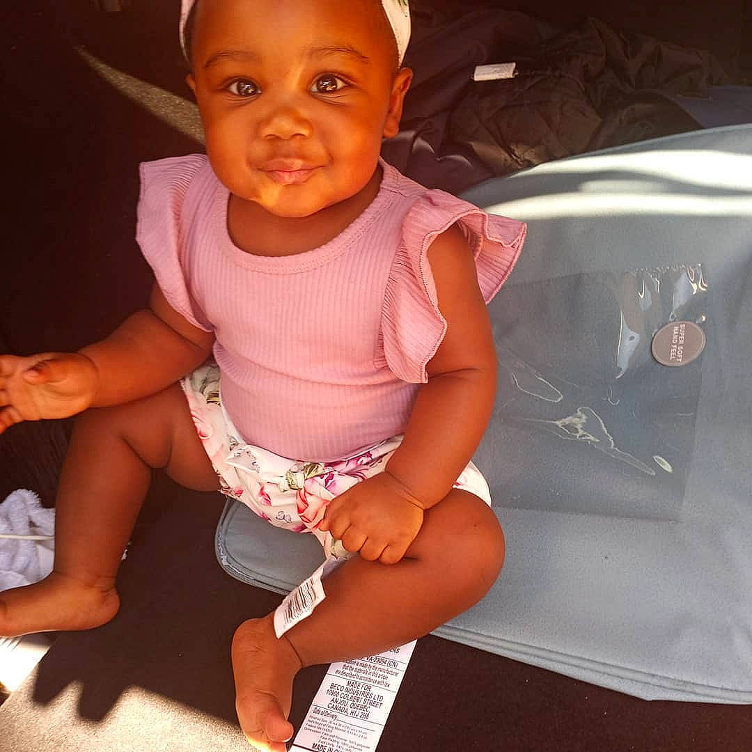 Kai'Lynn joined the competition — help win amazing prizes! arm, baby_toddler_clothing, face, finger, happy, head, human_body, joint, leg, lip, mouth, neck, person, pink, shorts, shoulder, skin, sleeve, smile, thigh