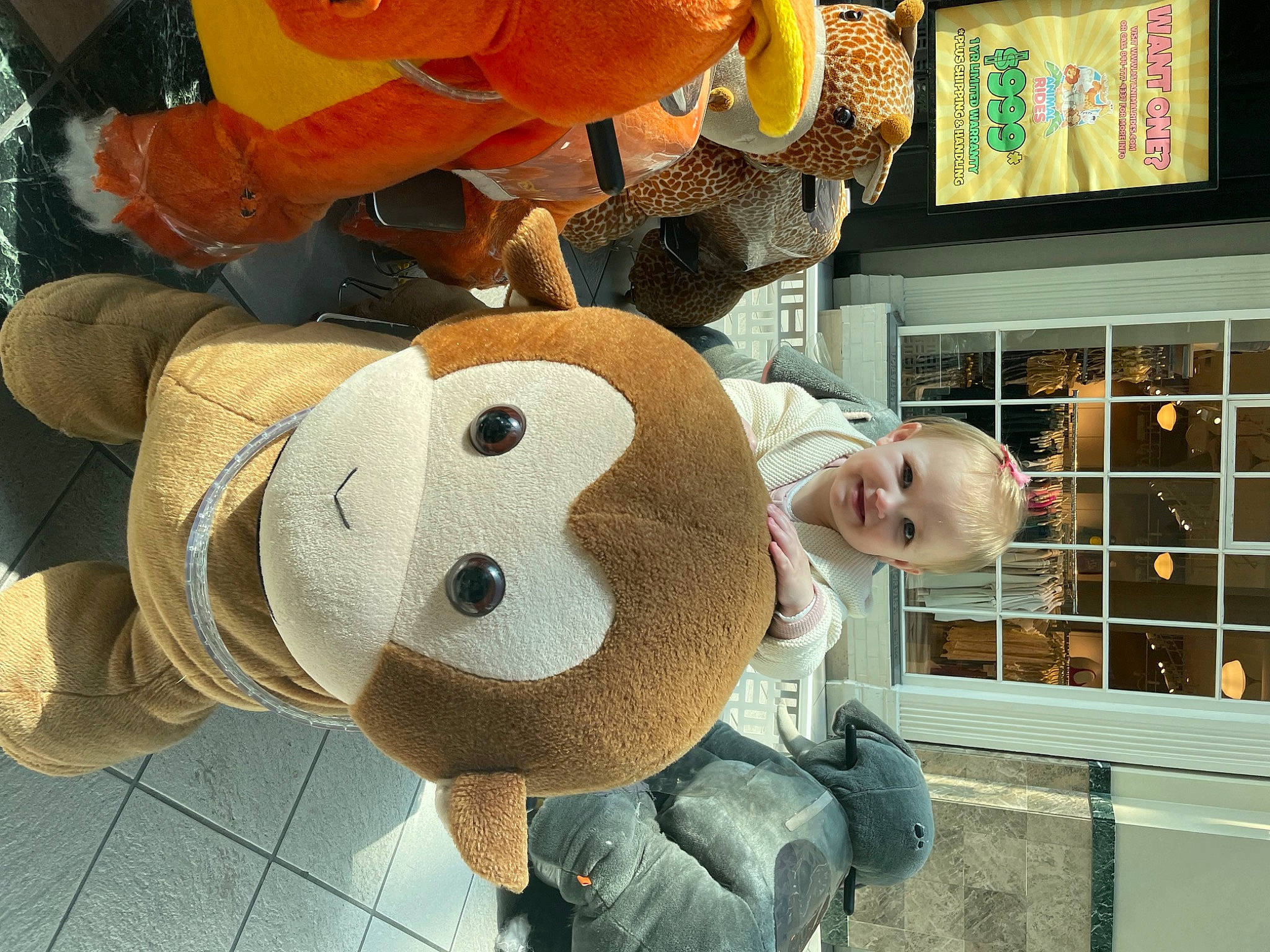 Valerie is registered to the contest to win money with this photo: art, building, fun, fur, hat, joy, lawn_ornament, mascot, person, personal_protective_equipment, plush, snapshot, stuffed_toy, toy, window, wood, working_animal