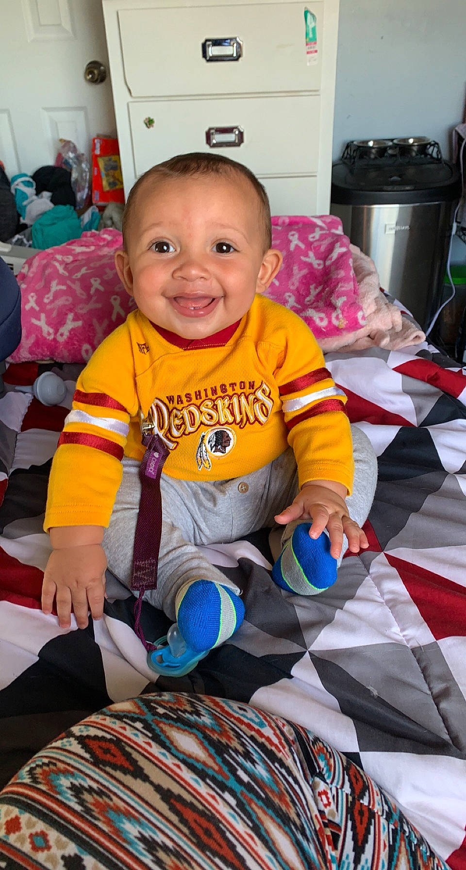 Oliver is registered to the contest to win money with this photo: baby, baby_toddler_clothing, blue, cabinetry, cheek, child, comfort, face, facial_expression, fun, green, happy, iris, joy, person, product, room, sleeve, smile, t_shirt