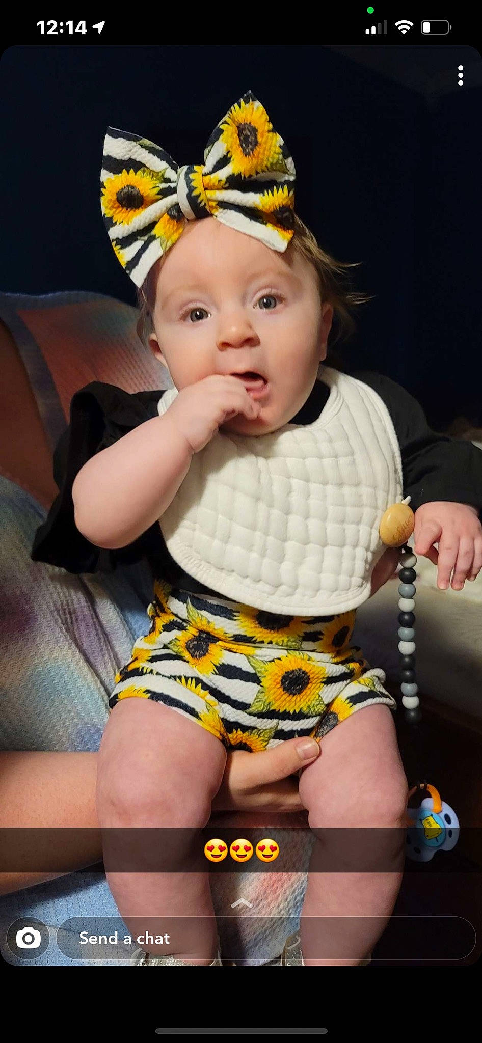 Mila Grace is registered to the contest to win money with this photo: baby_toddler_clothing, black, chair, cool, eye, facial_expression, finger, fun, hairstyle, hand, happy, human_body, knee, neck, organ, person, shorts, skin, surprise, thigh