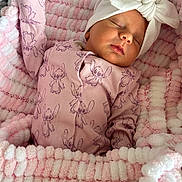 Sadie joined the competition — help win amazing prizes! baby, sleeping, blanket, pink, white, headband, bow, onesie, cartoon_print, infant, soft_texture, cozy, cute, child, face, peaceful, rest, closeup, newborn, comfort