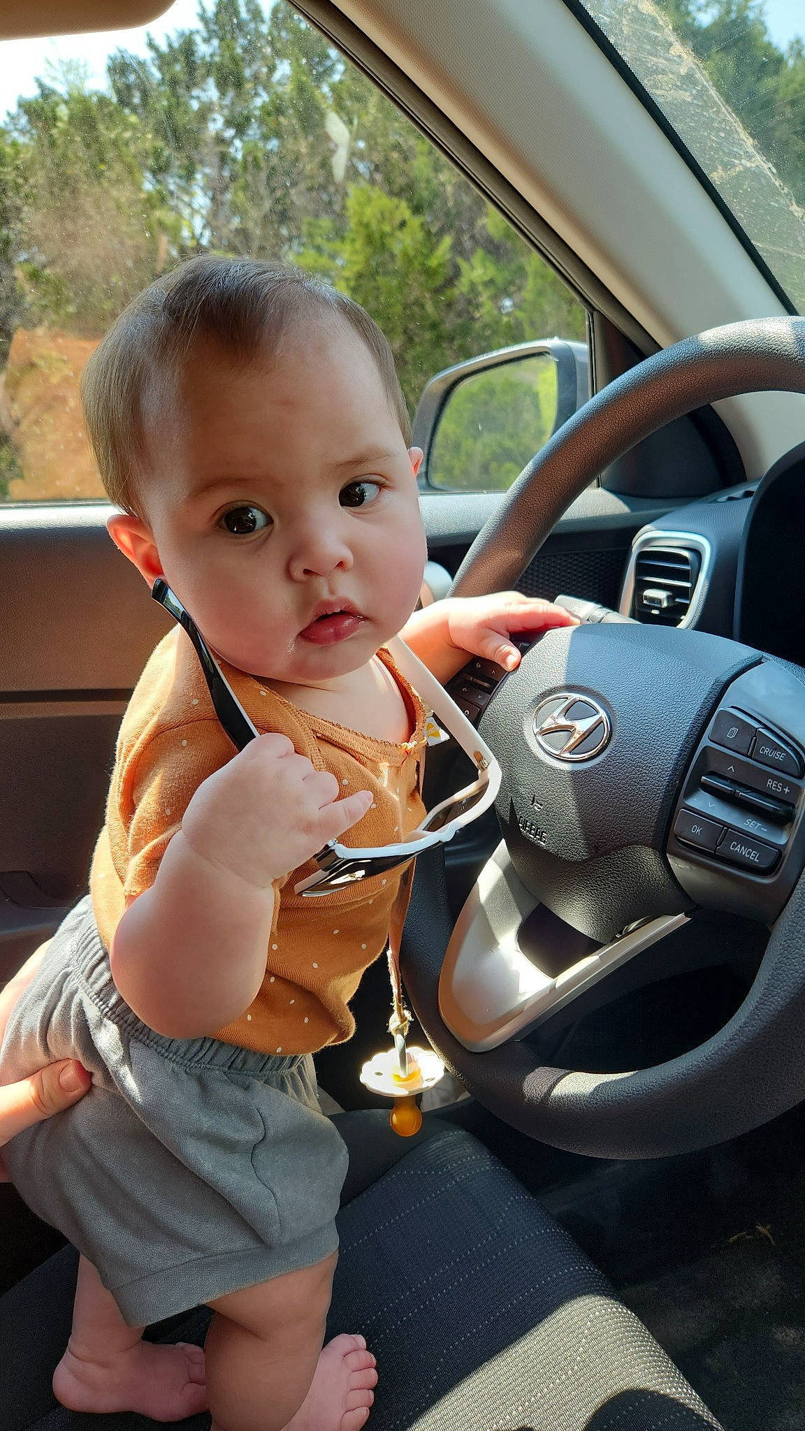 Kailani is registered to the contest to win money with this photo: auto_part, automotive_design, automotive_exterior, automotive_mirror, automotive_wheel_system, automotive_window_part, baby, car, car_seat, child, family_car, luxury_vehicle, motor_vehicle, person, steering_part, steering_wheel, toddler, tree, vehicle, vehicle_door