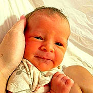 Joanna joined the competition — help win amazing prizes! baby, newborn, infant, hand, fist, close_up, skin, person, cute, sleepy, child, soft, blanket, resting, portrait, human, toddler, clothing, comfort, gentle