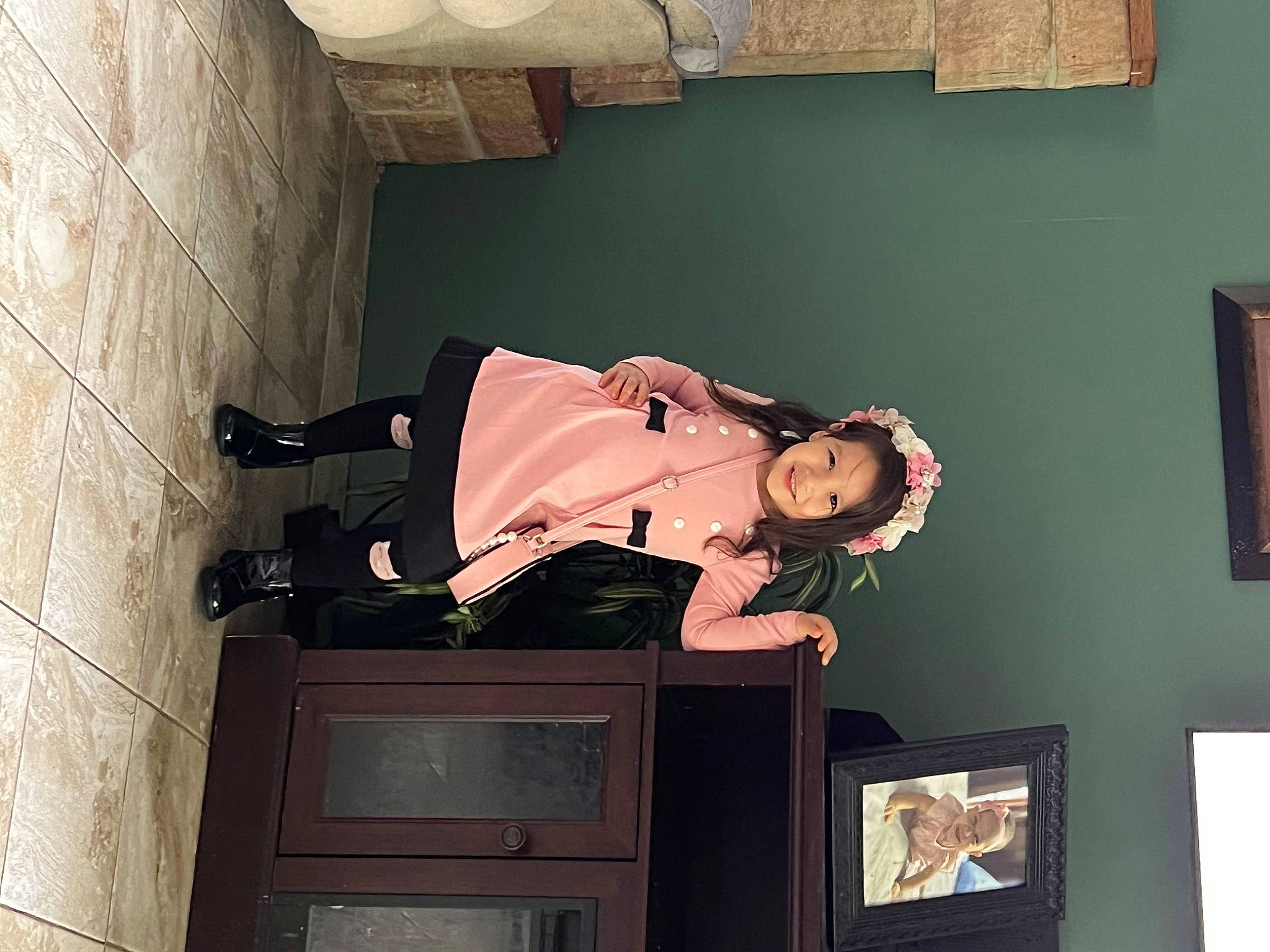 Gianna joined the competition — help win amazing prizes! ceiling, door, hardwood, home_door, joy, person, picture_frame, plaster, room, walking_shoe, wood, wrist