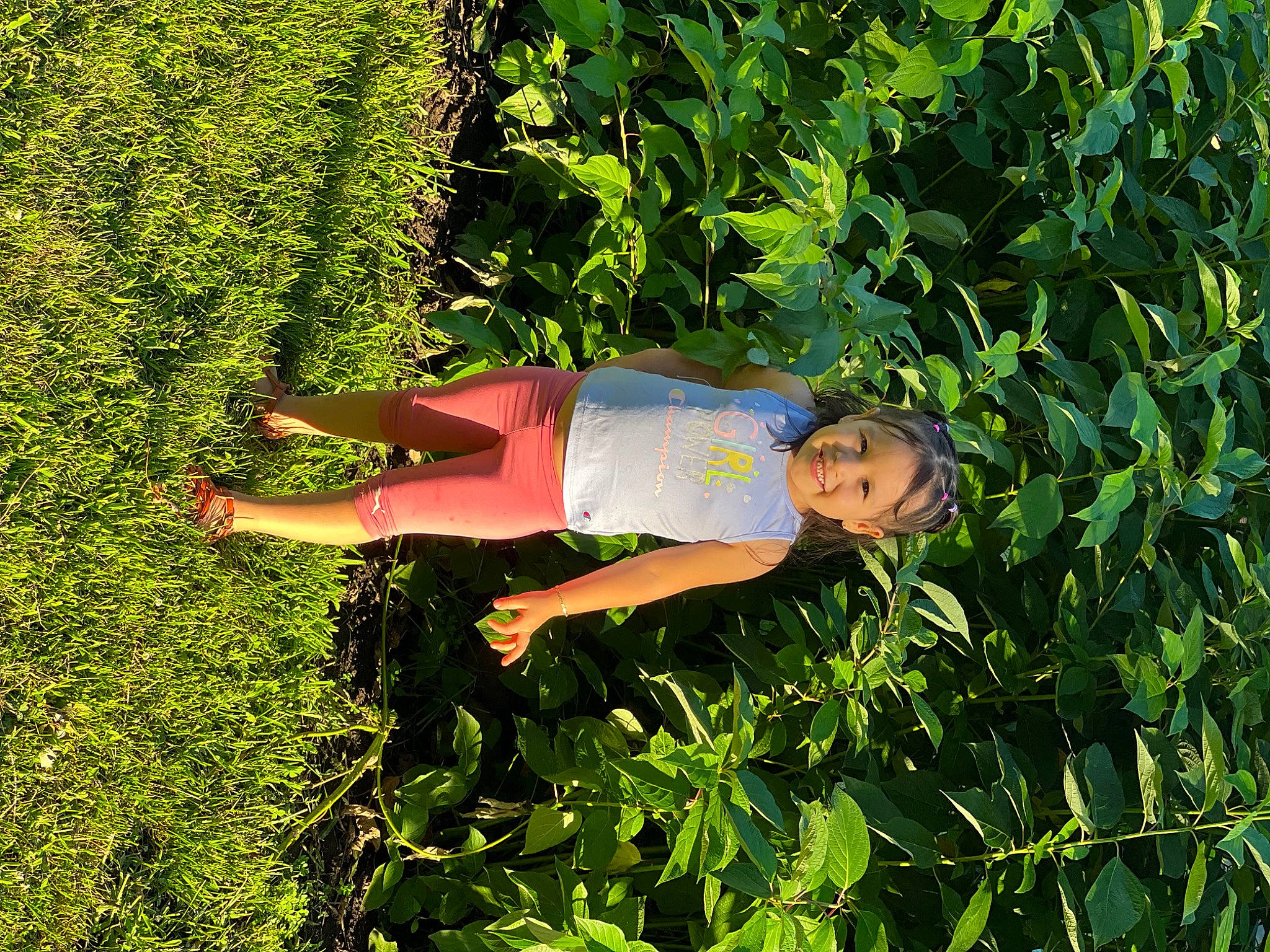 Gianna is registered to the contest to win money with this photo: agriculture, elbow, farmer, farmworker, field, flowering_plant, garden, gardening, grass, grass_family, groundcover, happy, hat, hedge, joy, people_in_nature, person, plant, plantation, shrub