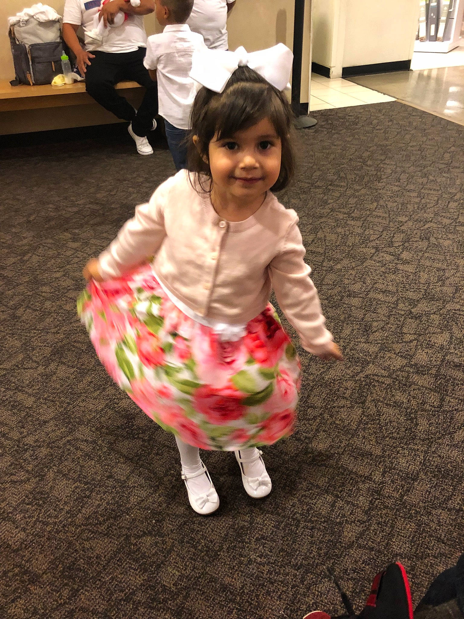 Joselyn is registered to the contest to win money with this photo: baby, child, costume, dress, floor, flooring, fun, joy, person, pink, play, skin, smile, toddler