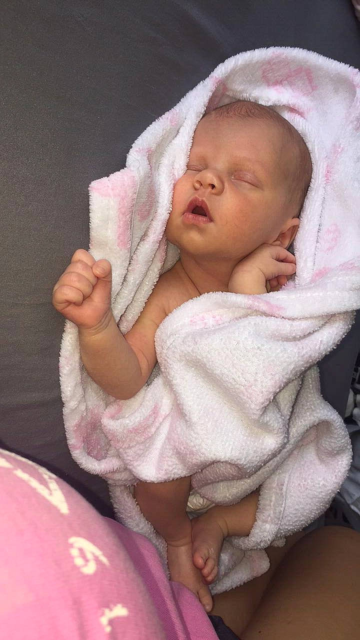 Annabella is registered to the contest to win money with this photo: baby, baby_products, baby_sleeping, cheek, child, linens, person, pink, product, skin, textile, toddler