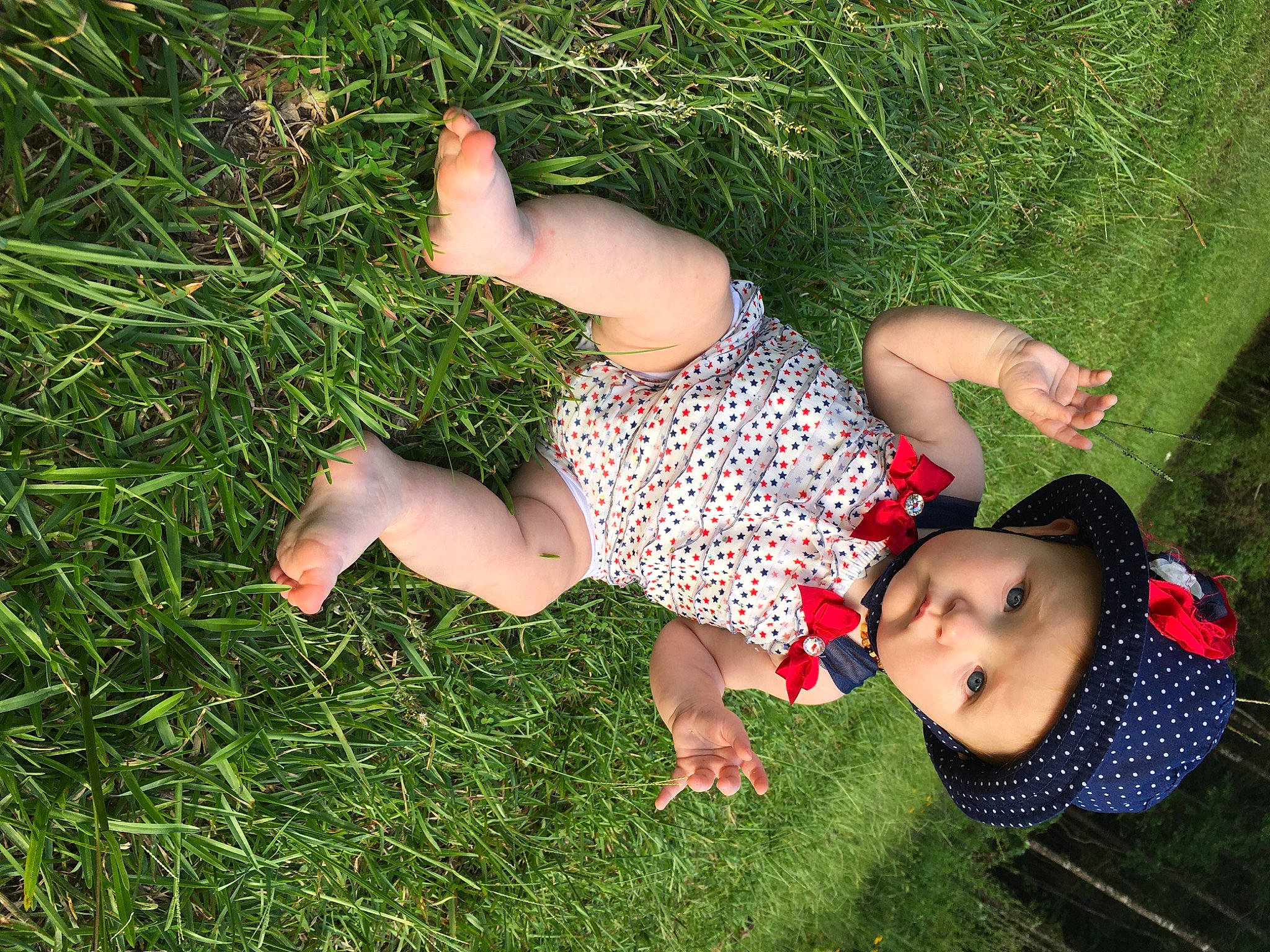 Makinleigh joined the competition — help win amazing prizes! arm, barefoot, black_hair, child, finger, fun, grass, grass_family, green, hand, happy, headwear, lawn, leaf, leg, leisure, meadow, people_in_nature, person, plant