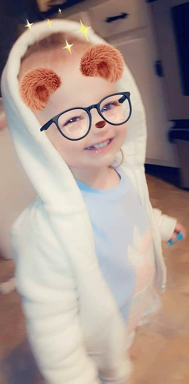 Niomi is registered to the contest to win money with this photo: costume, eyelash, eyewear, fashion_accessory, fun, fur, gesture, glasses, glove, goggles, happy, hat, human_body, jaw, joy, person, personal_protective_equipment, sleeve, smile, sunglasses