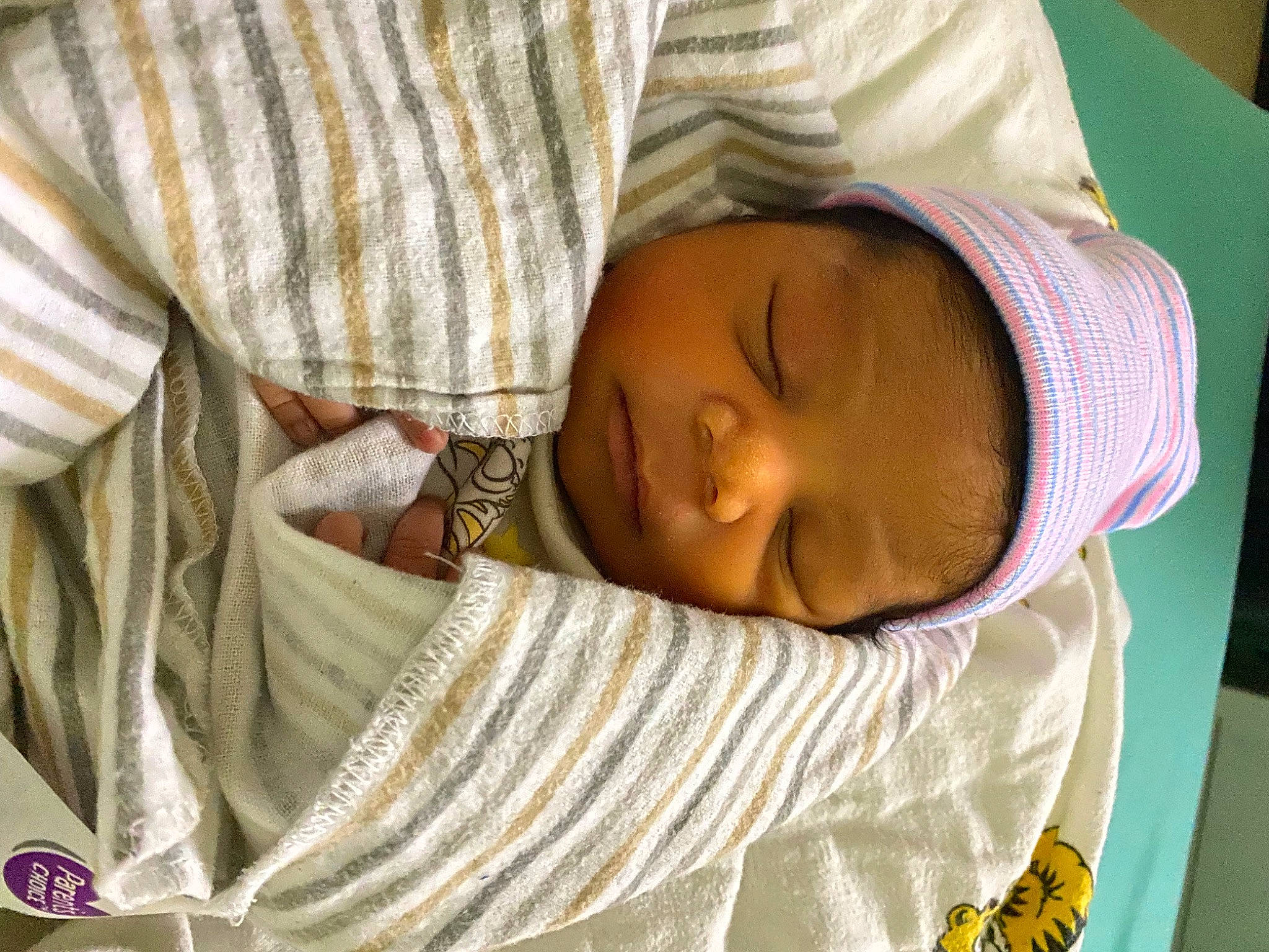 Damari is registered to the contest to win money with this photo: baby, baby_toddler_clothing, bedtime, cheek, child, chin, comfort, eyebrow, eyelash, facial_expression, forehead, linens, mouth, nap, nose, person, room, skin, sleep, sleeve