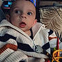 Malo Chambre participe au concours pour gagner de l'argent avec cette photo : baby, background_blur, child, computer, couch, cozy, face, furniture, hand, home, indoor, lighting, monitor, person, playtime, striped_clothing, surprised_expression, sweater, toy, wide_eyes