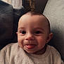 Malo Chambre participe au concours pour gagner de l'argent avec cette photo : baby, child, childhood, couch, cozy, cute, face, happy, head, home, indoor, infant, person, portrait, relaxed, smiling, soft_lighting, sweater, tongue_out, warm