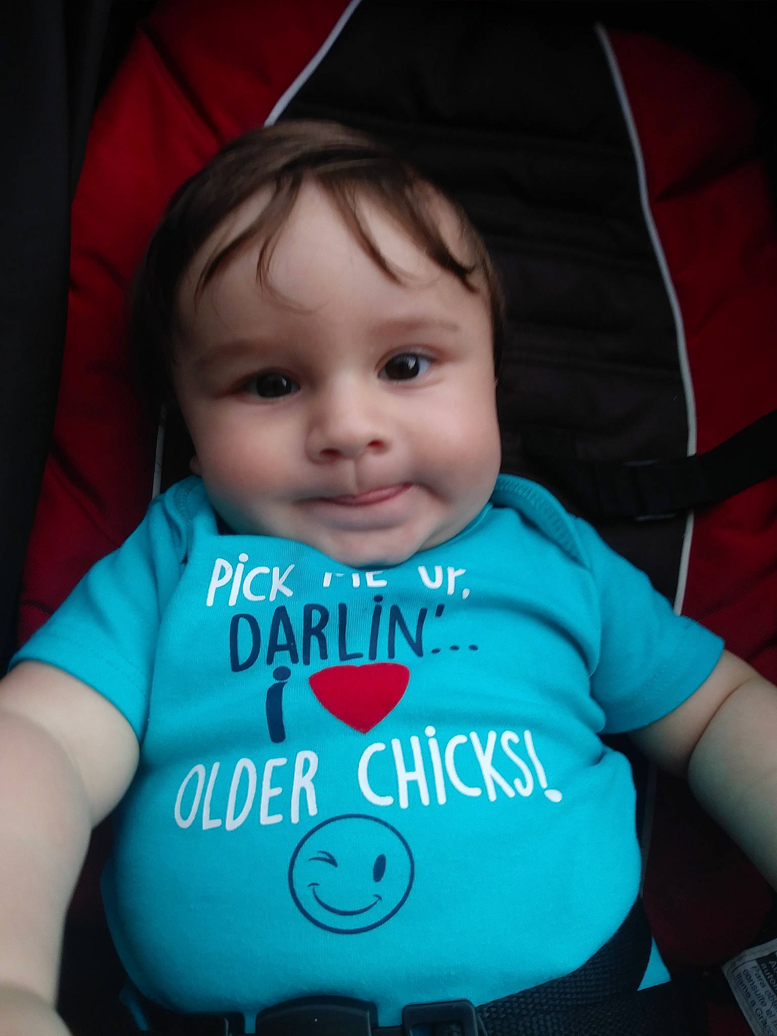 Nikolas is registered to the contest to win money with this photo: baby, baby_products, baby_toddler_clothing, blue, cheek, child, cool, eye, head, iris, lip, mouth, person, product, skin, sleeve, smile, t_shirt, teal, toddler